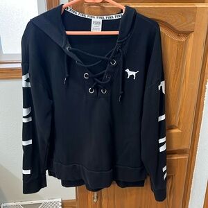Victoria Secrets Pink Black hooded sweatshirt.